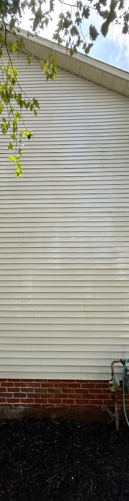 Siding and foundation after cleaning